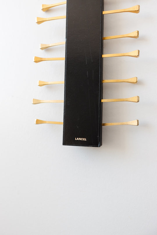midcentury french brass and leather Longchamp tie rack by Jacques Adnet