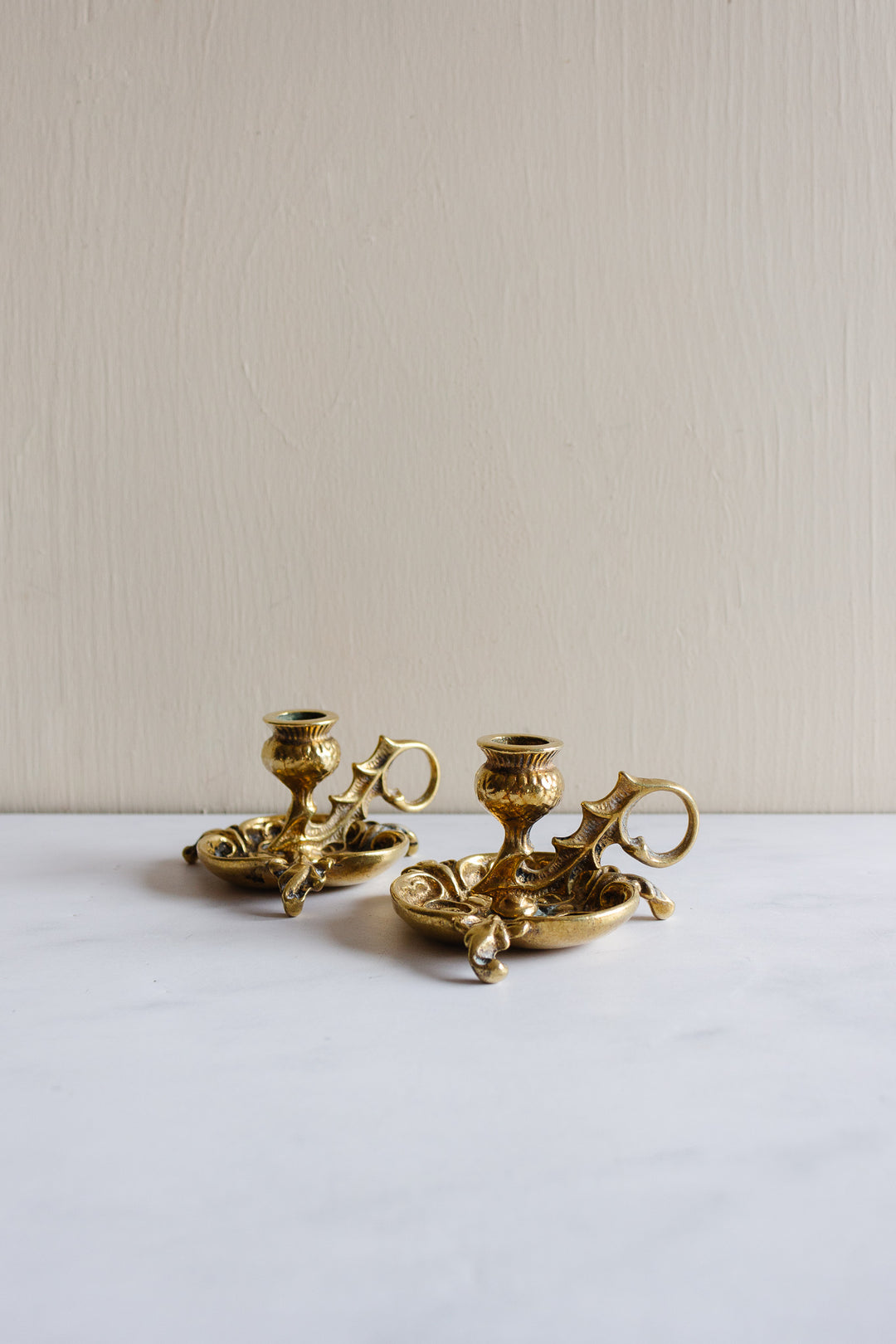 pair of vintage French cast brass chambersticks