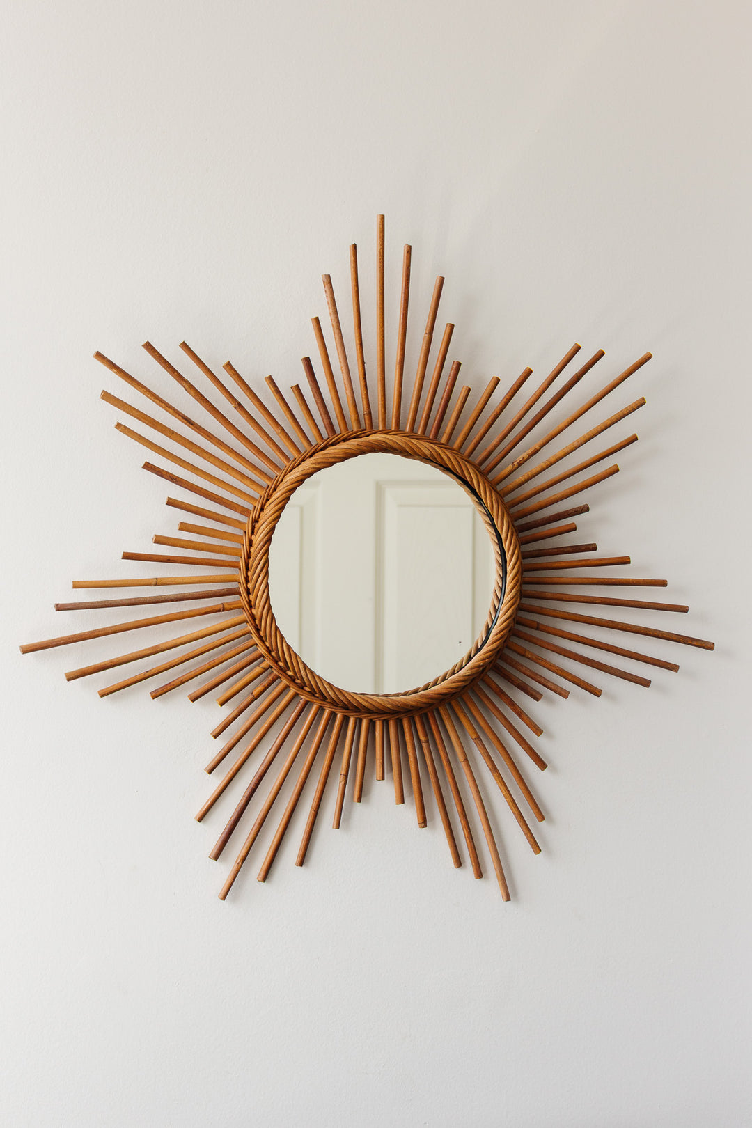 midcentury french rattan starburst mirror