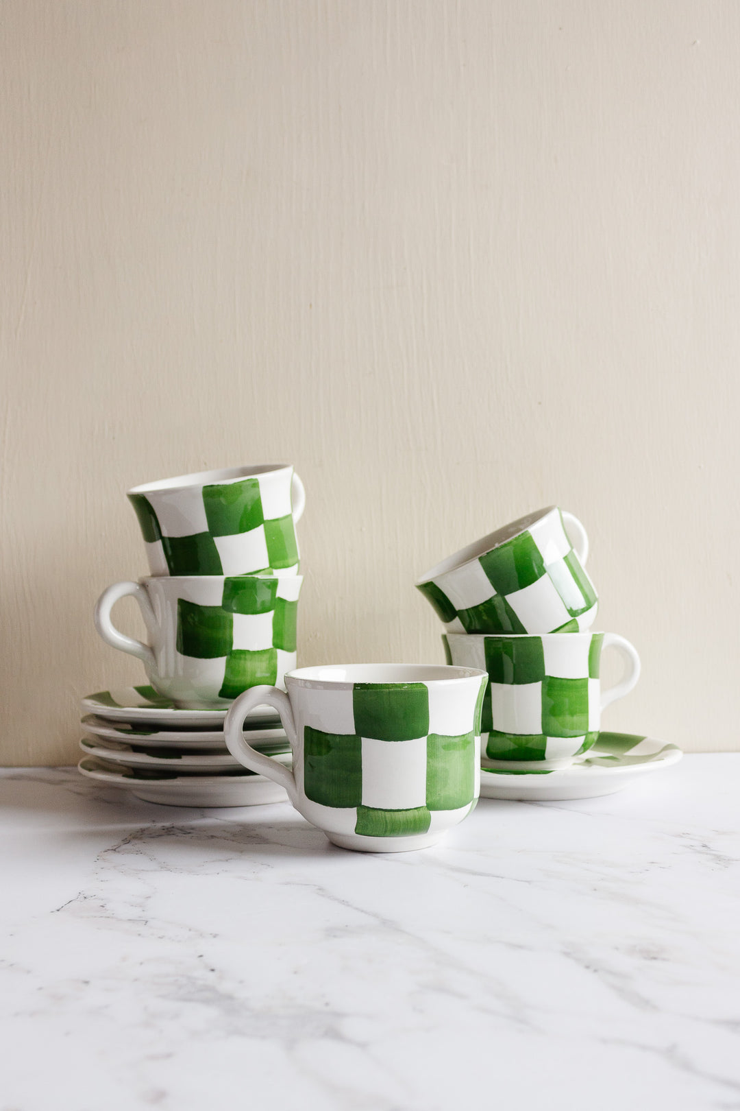 checkered cup and saucer set by ceramica san marciano