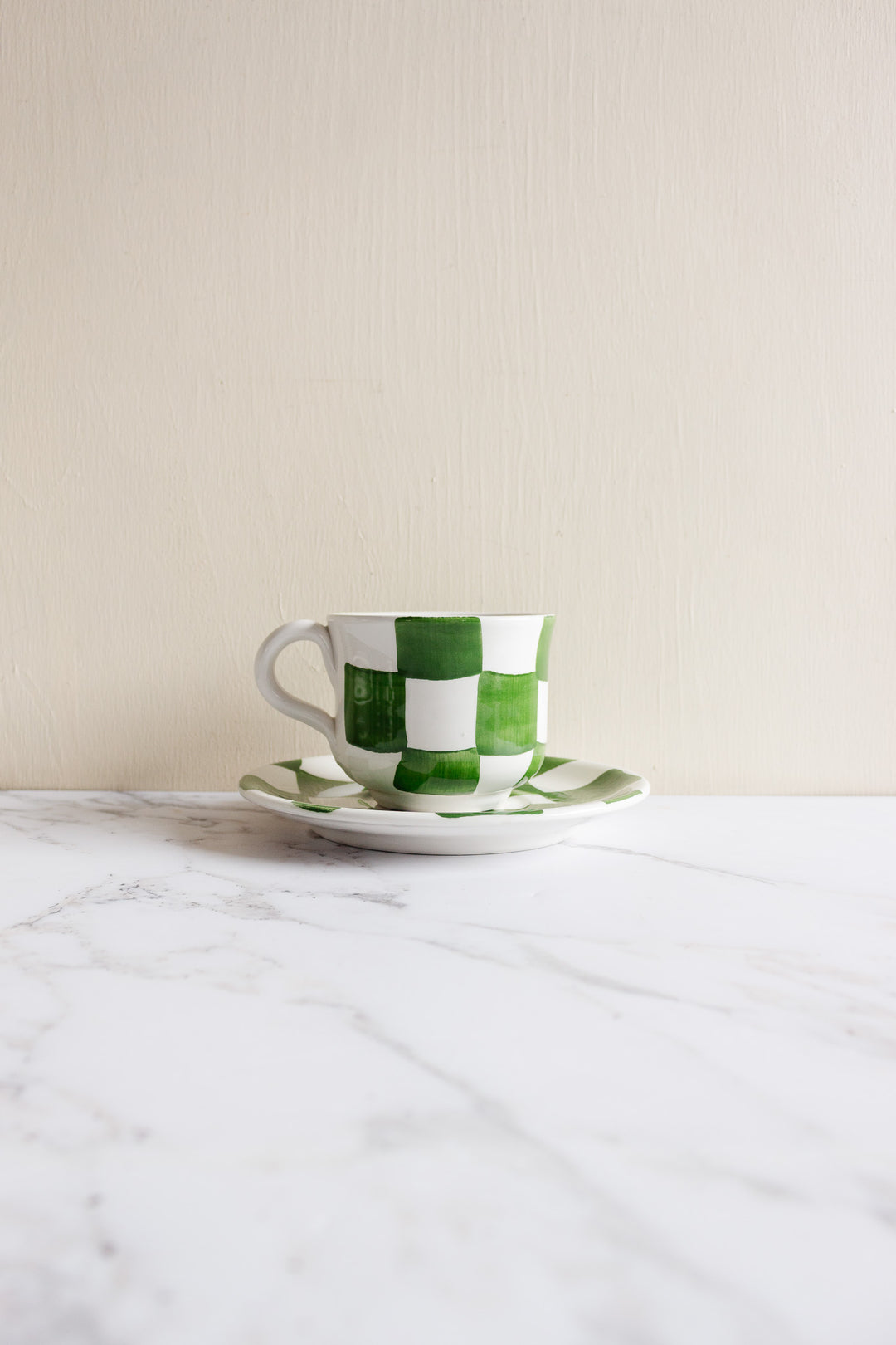 checkered cup and saucer set by ceramica san marciano