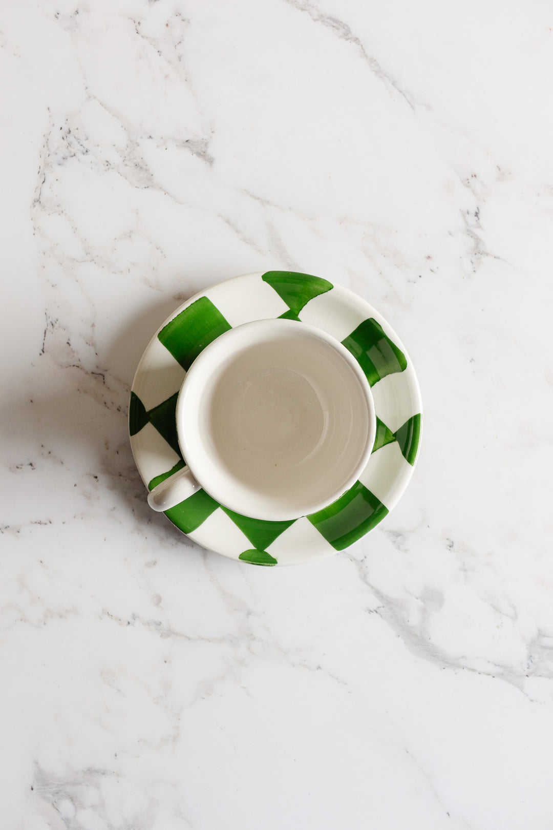 checkered cup and saucer set by ceramica san marciano