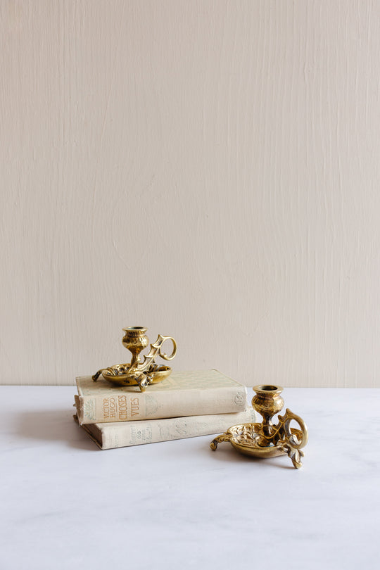 pair of vintage French cast brass chambersticks