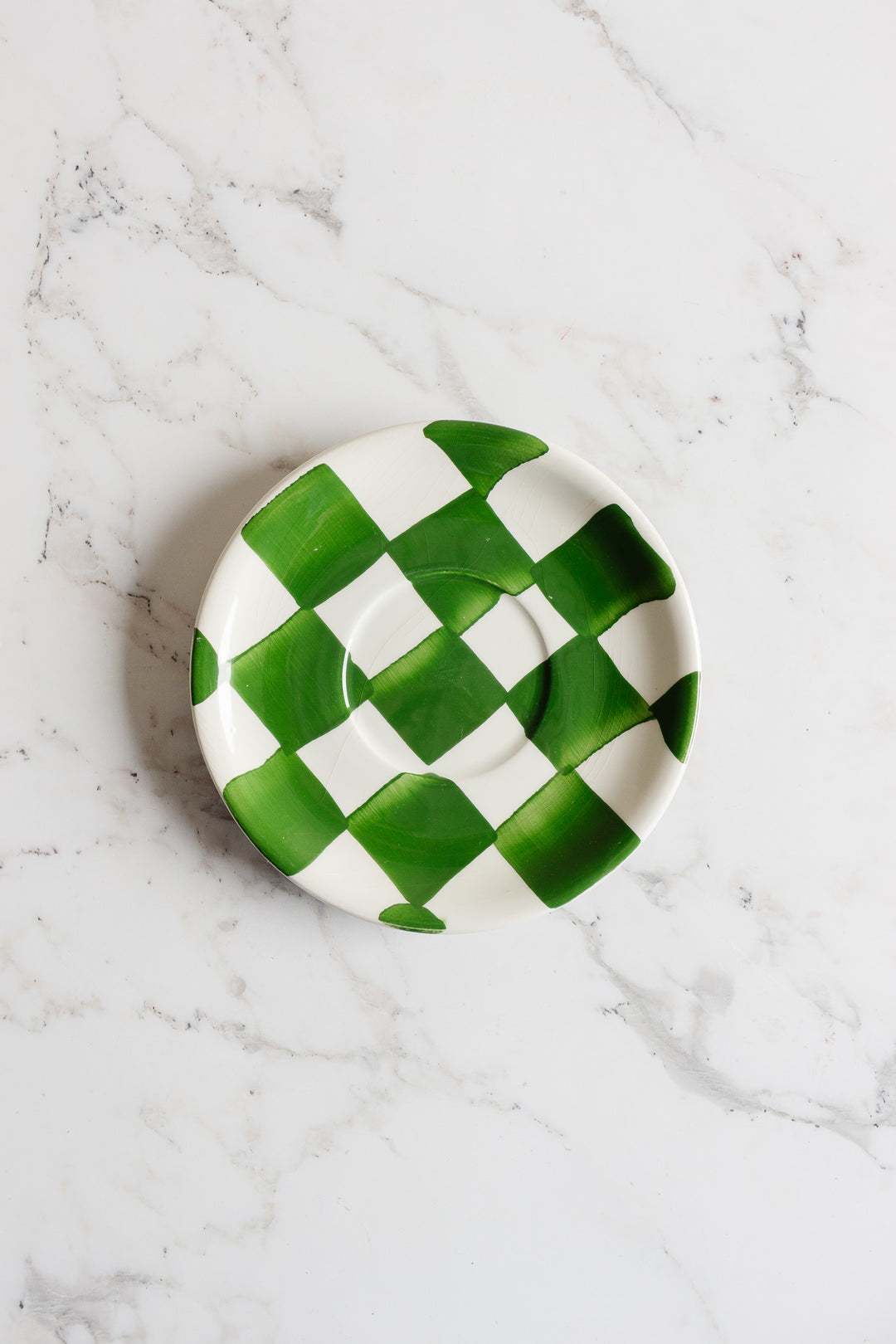 checkered cup and saucer set by ceramica san marciano