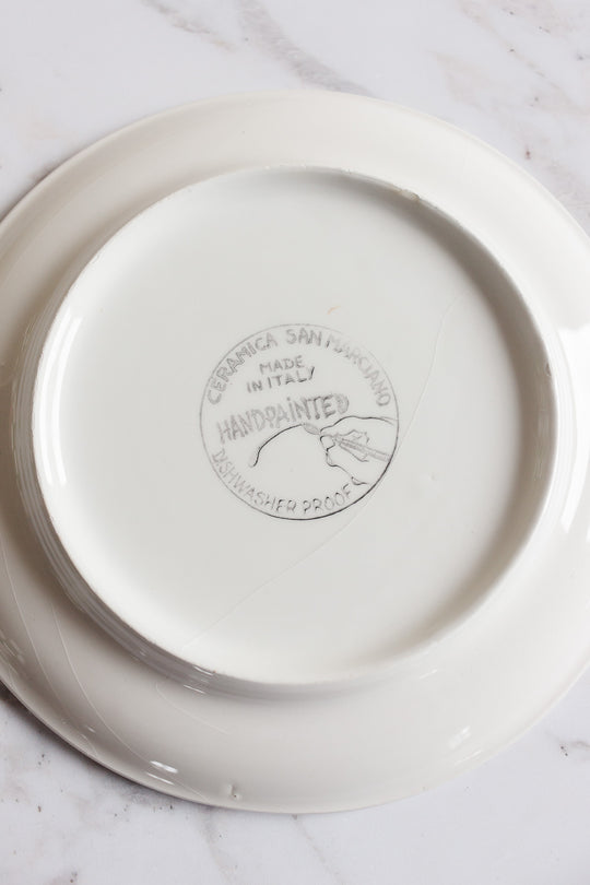 checkered cup and saucer set by ceramica san marciano