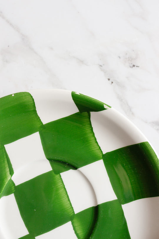 checkered cup and saucer set by ceramica san marciano