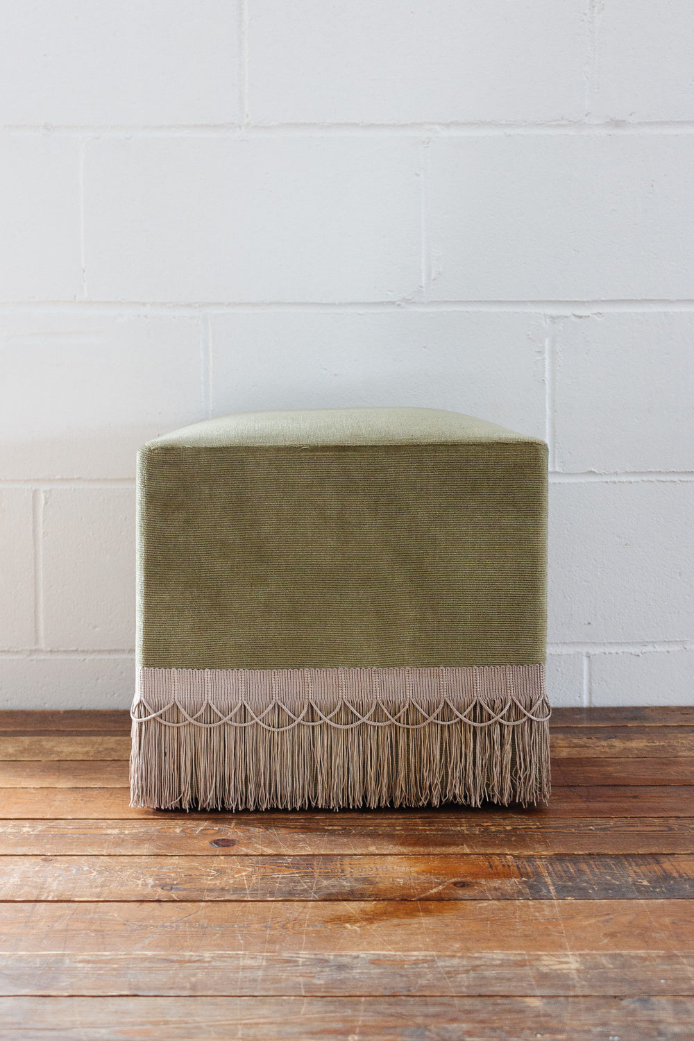 midcentury French green velvet fringe ottoman
