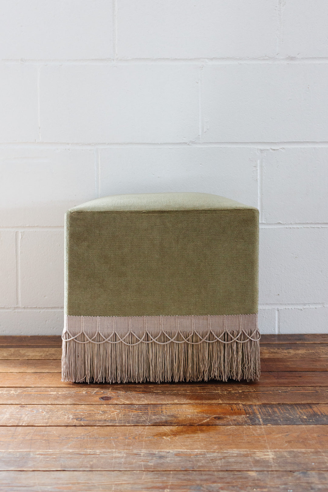 midcentury French green velvet fringe ottoman