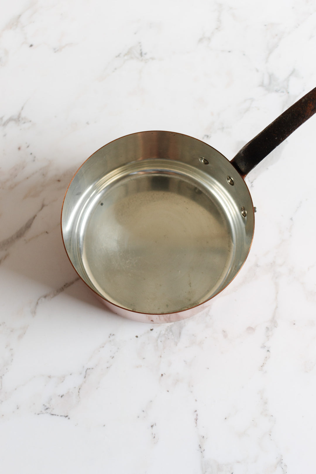 set of 3 vintage french copper pots with cast iron handles