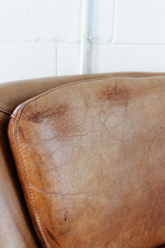 vintage European sheepskin leather wingback club chair