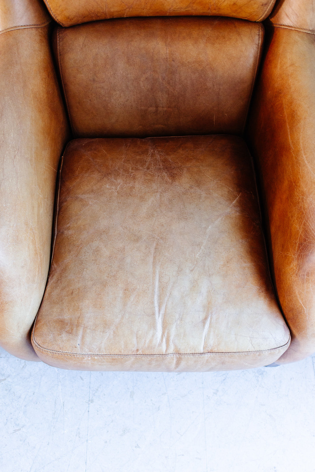 vintage European sheepskin leather wingback club chair