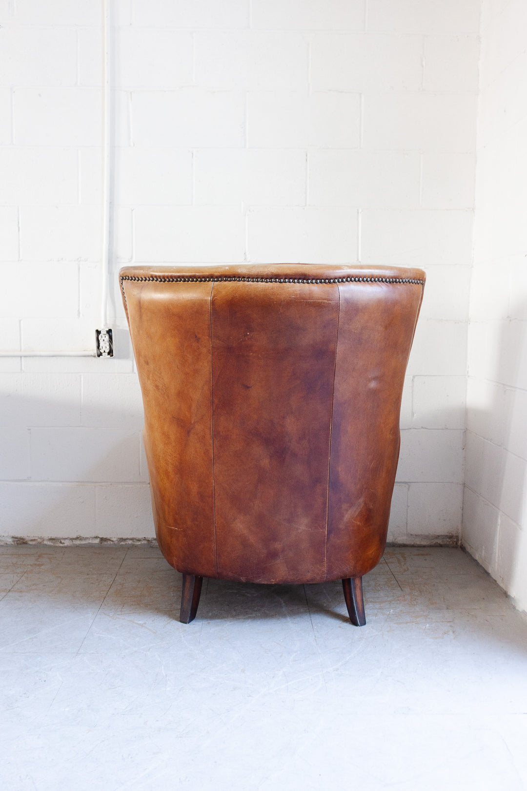 vintage European sheepskin leather wingback club chair