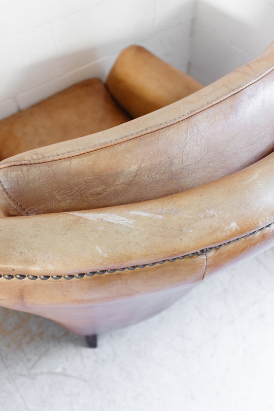 vintage European sheepskin leather wingback club chair