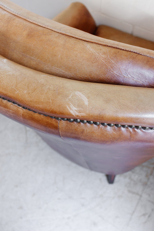 vintage European sheepskin leather wingback club chair