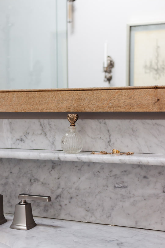 antique french perfume bottle pair with silver heart stopper