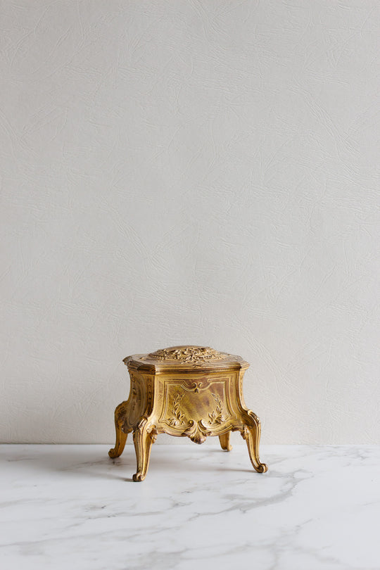 antique french bijoux heavy cast metal casket with tufted fabric lining