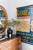 antique French zinc-backed advertising poster, “A La Gerbe d’Or”