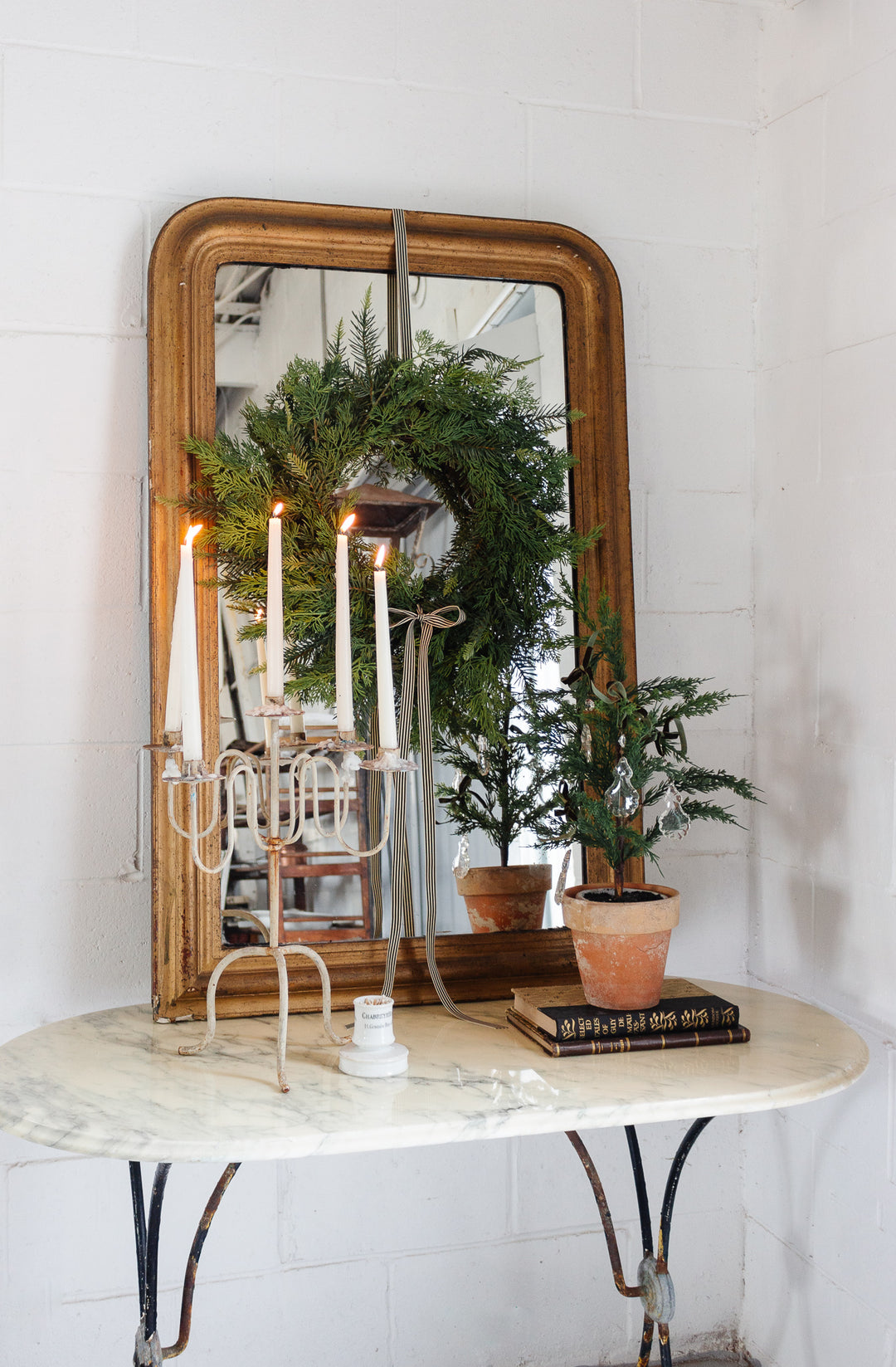 French bistro table with antique cast iron base and vintage marble top