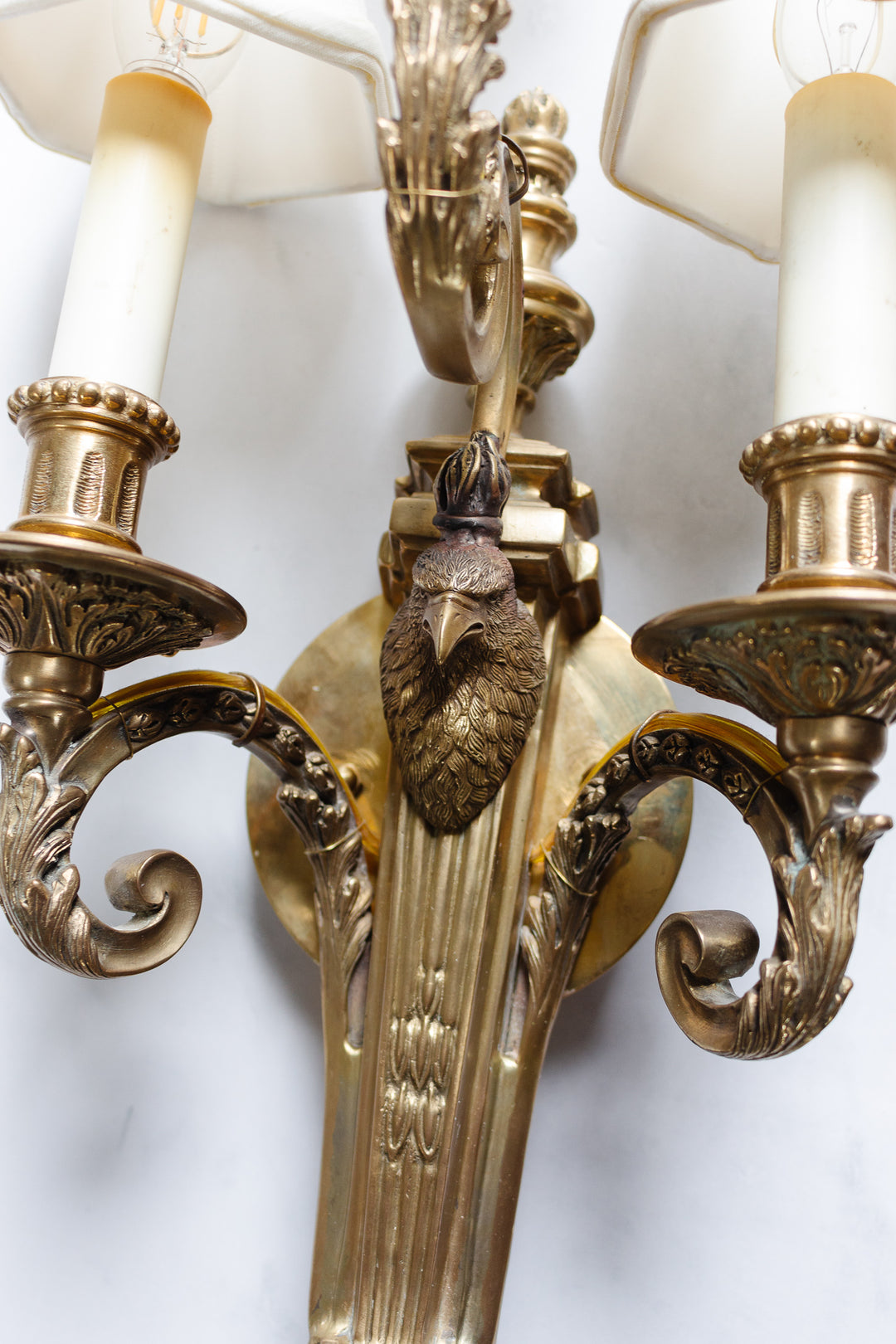 pair of vintage French bronze eagle head wall sconces