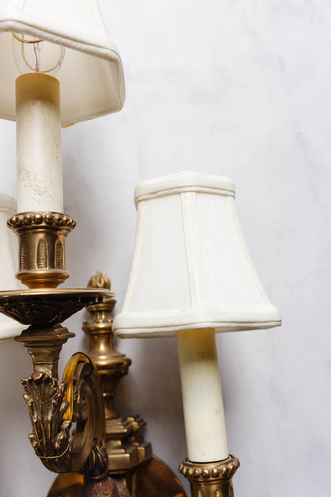 pair of vintage French bronze eagle head wall sconces