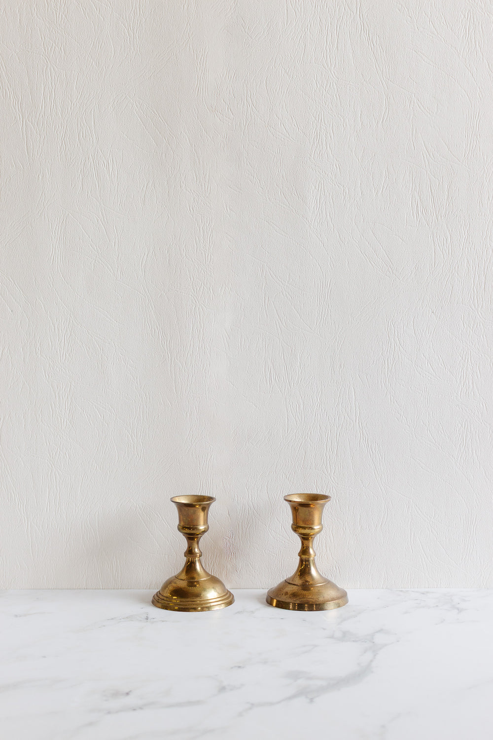 pair of vintage french brass candlesticks
