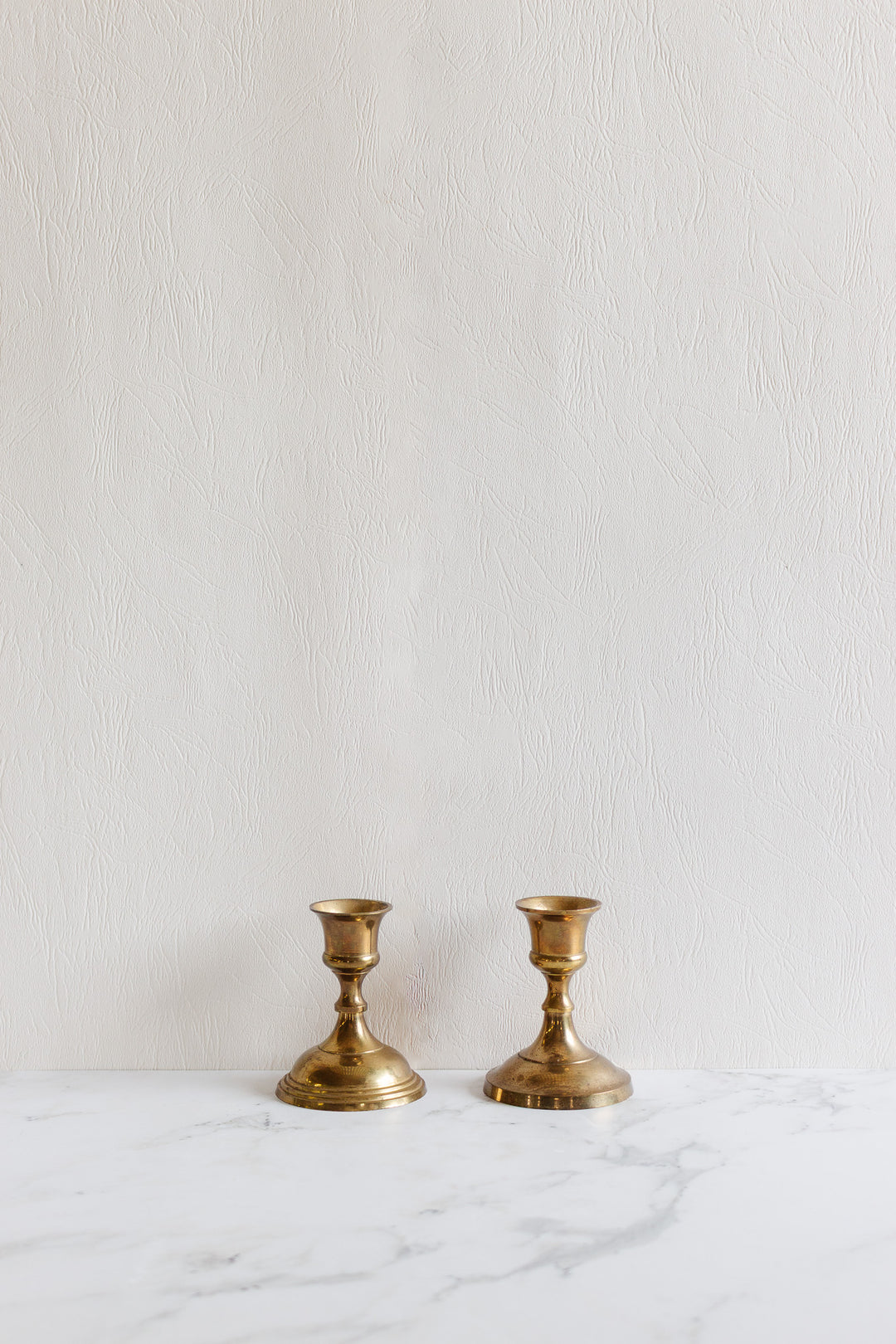 pair of vintage french brass candlesticks