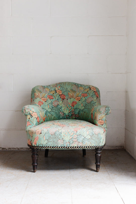 antique french crapaud chair with floral fabric
