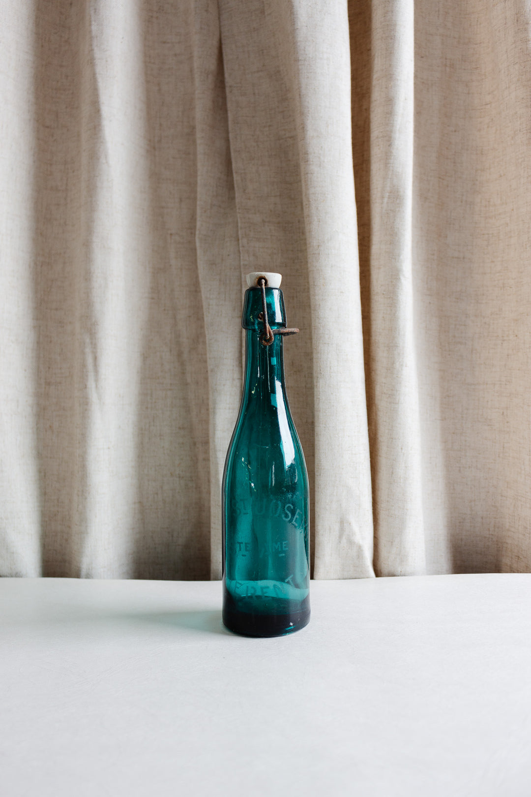 vintage french blue bistro bottle with porcelain top