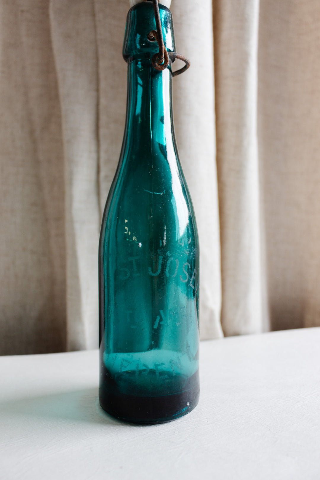 vintage french blue bistro bottle with porcelain top