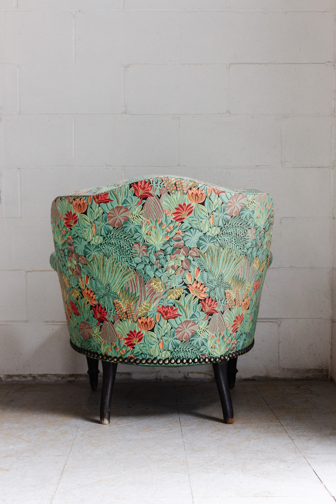 antique french crapaud chair with floral fabric