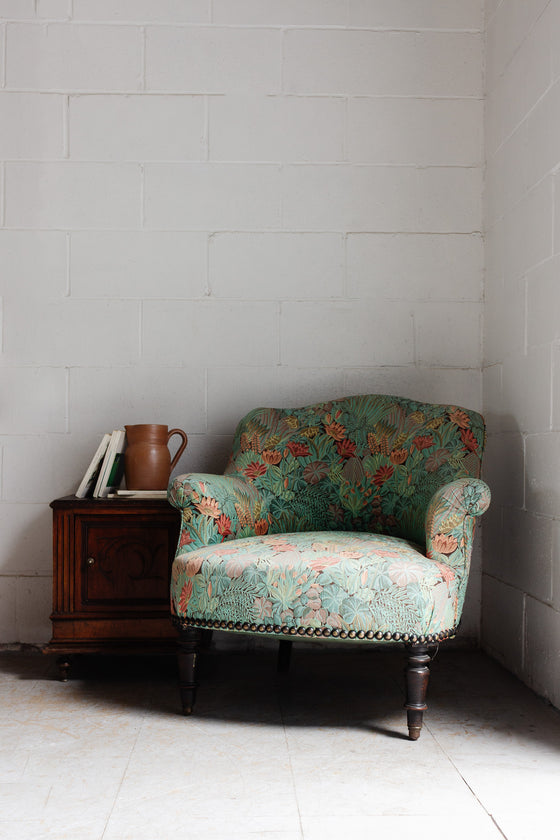 antique french crapaud chair with floral fabric