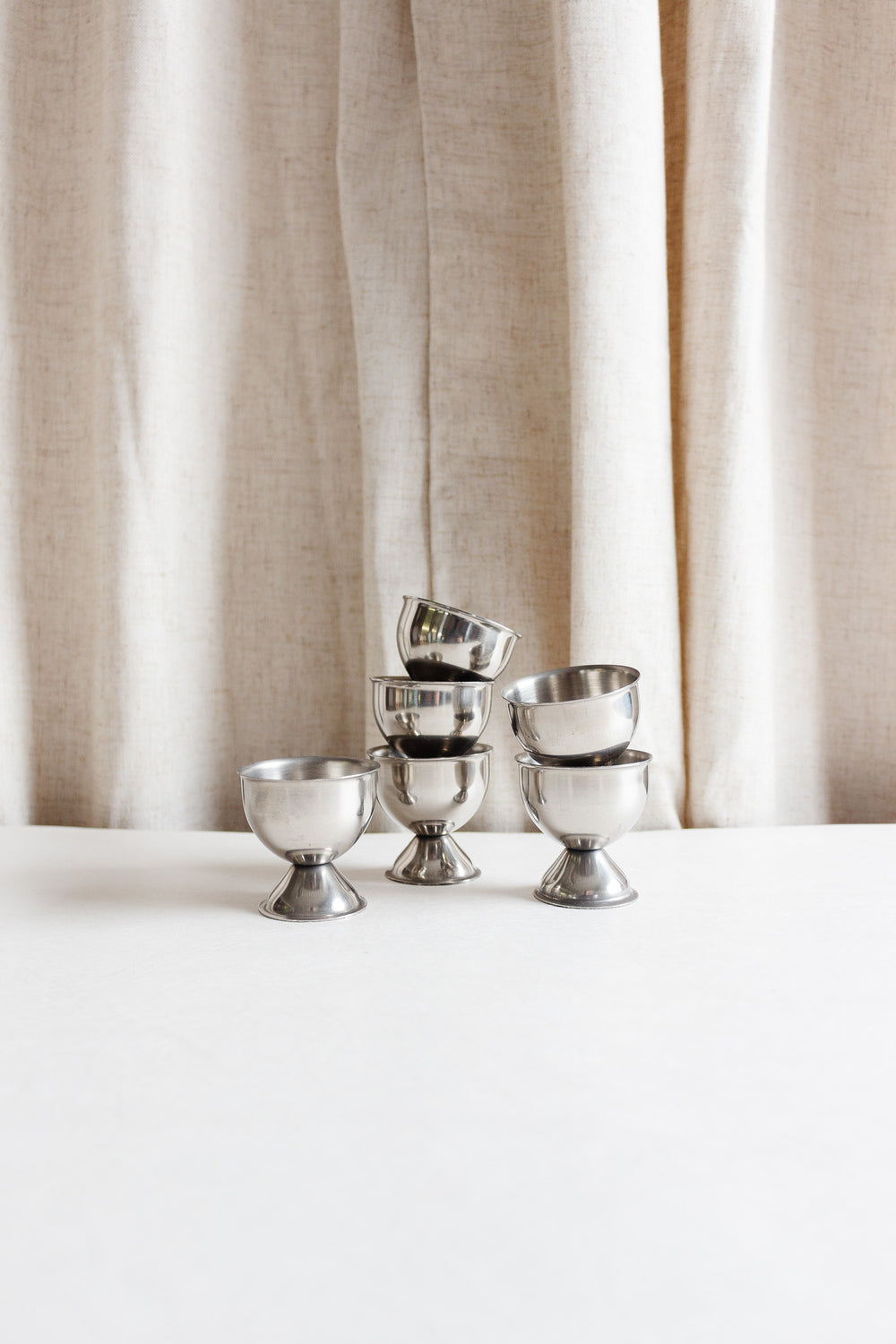 vintage french metal egg cups, set of six