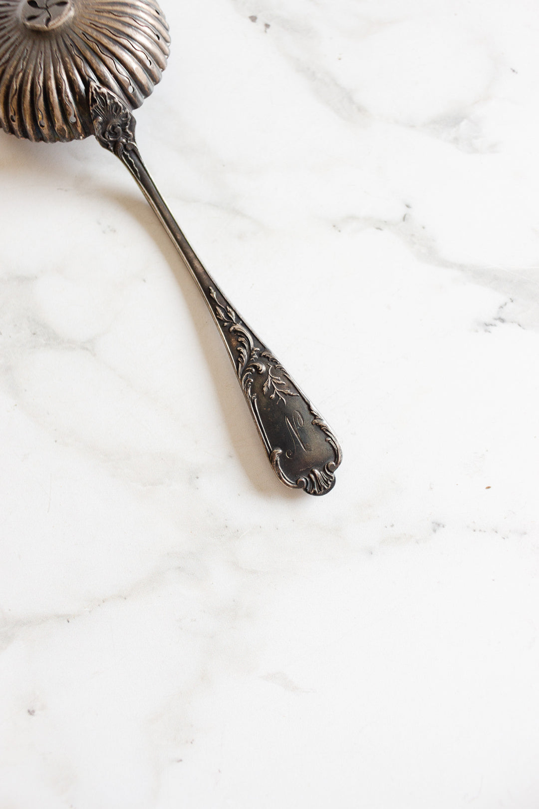 antique french monogrammed "N" sugar sifting spoon