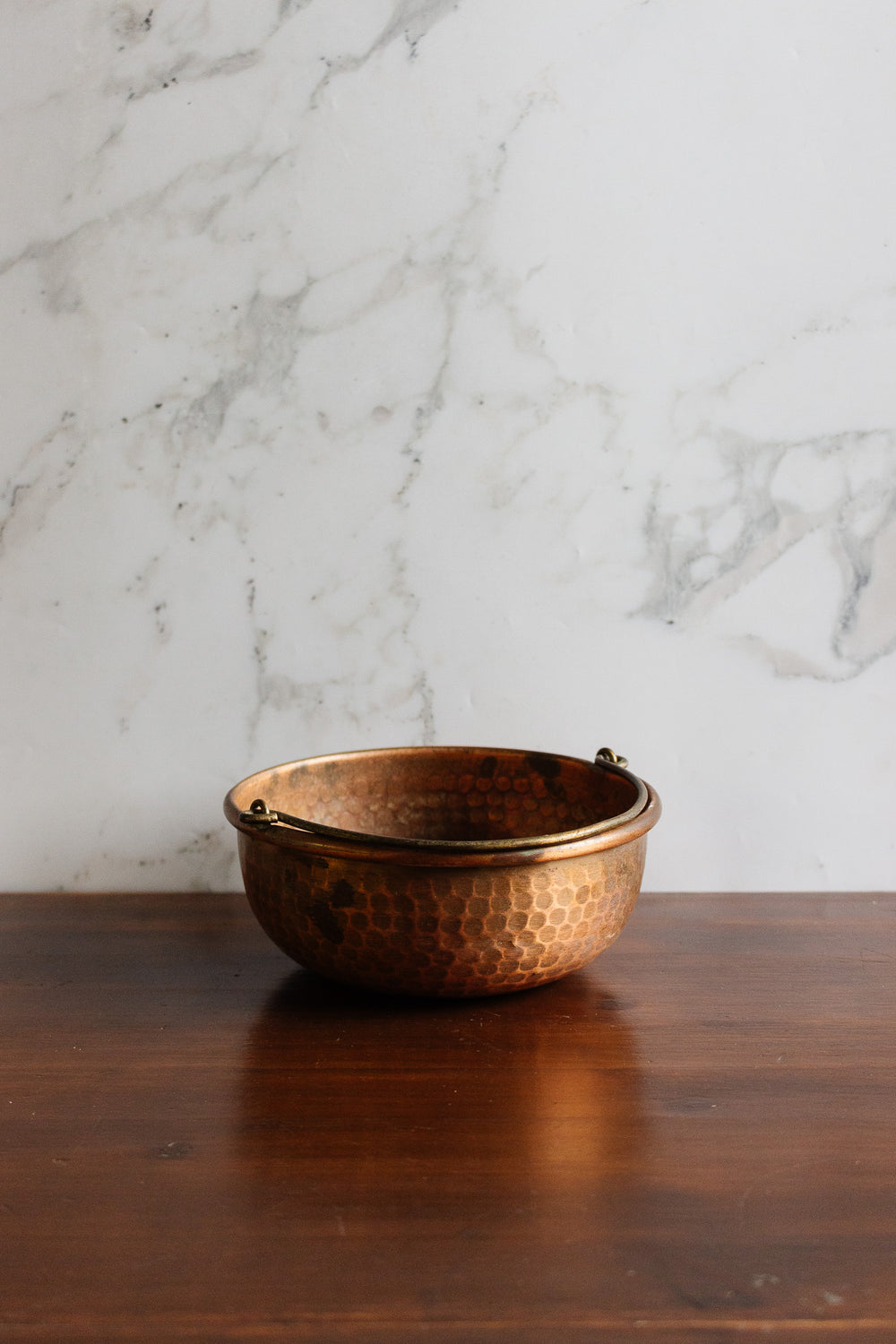 vintage european hammered copper bowl with handle