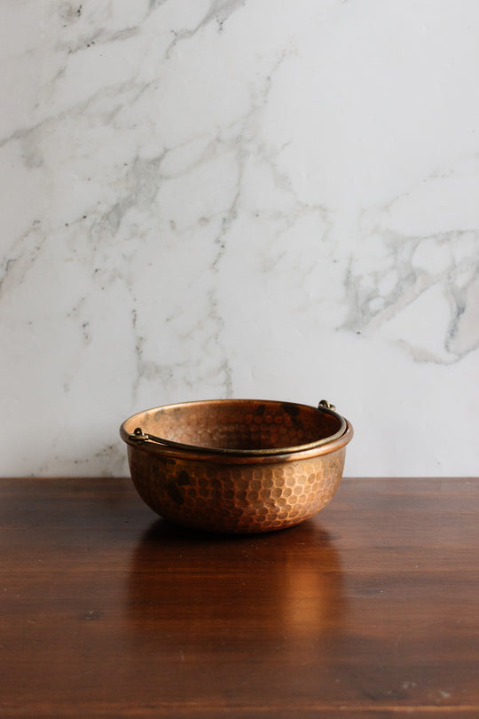 vintage european hammered copper bowl with handle
