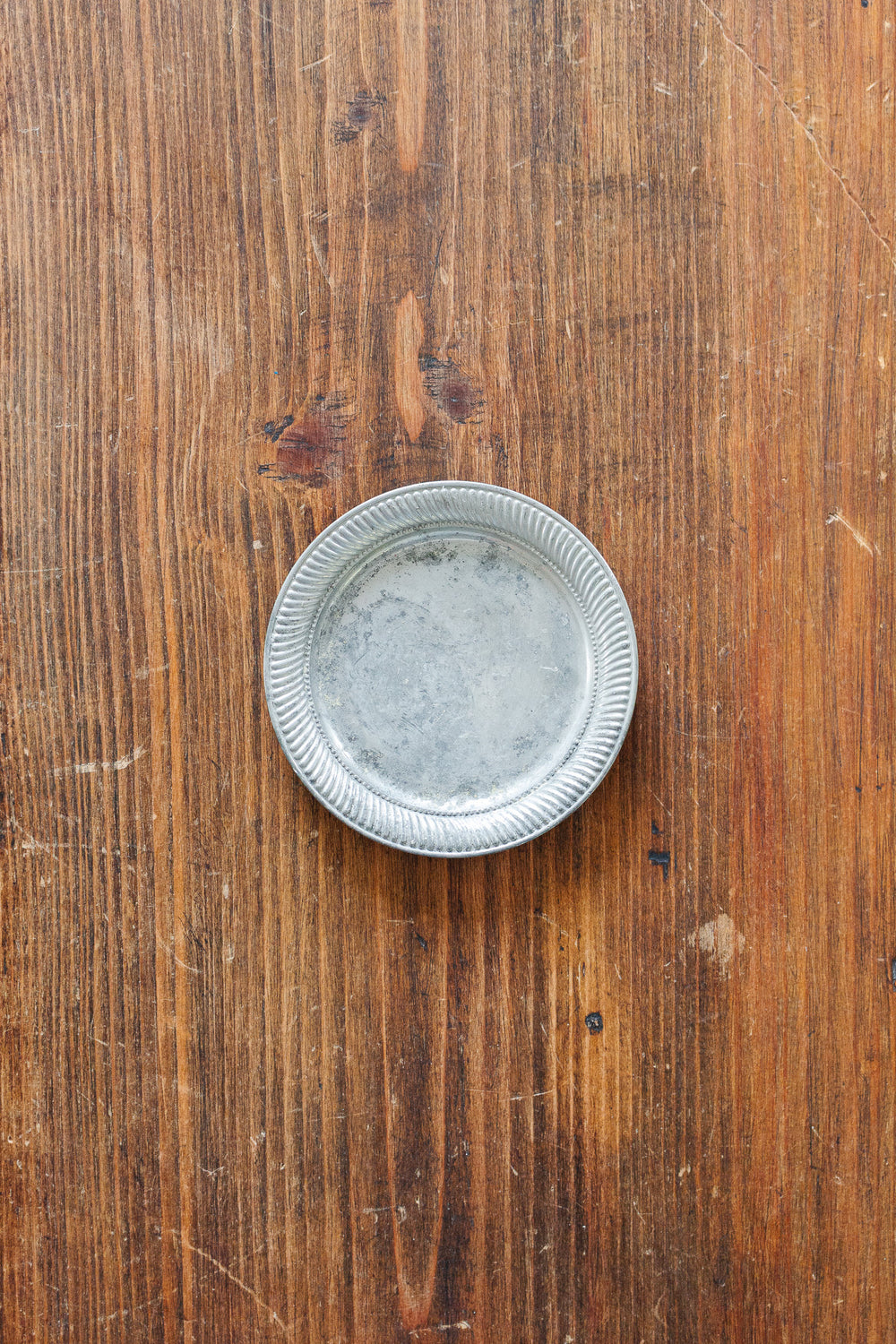 antique french "l'étain à la rose" bottle coaster