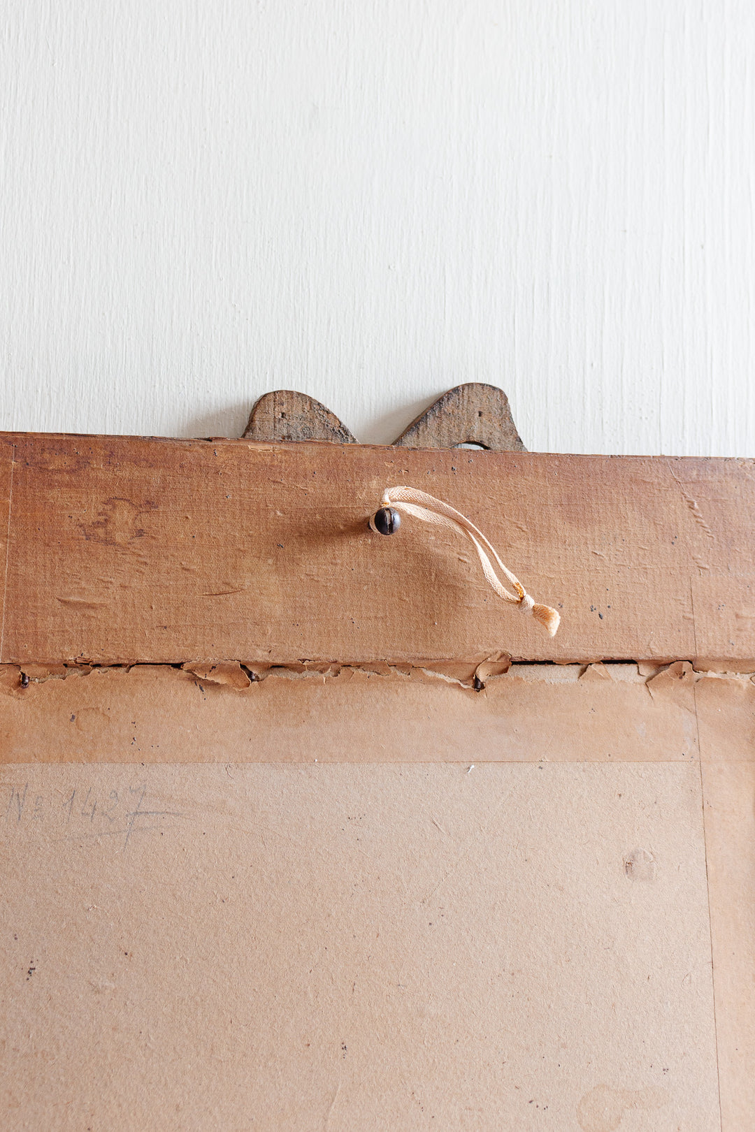 antique French carved oak mirror with Louis XVI style bow cornice