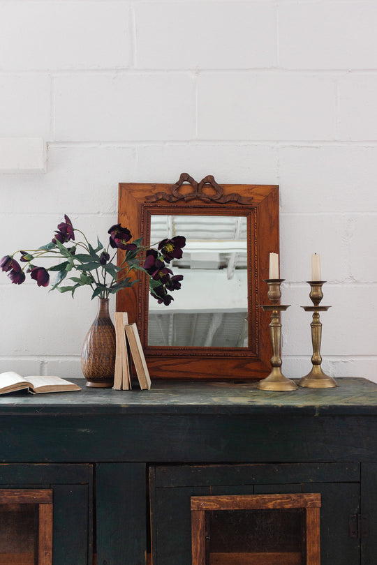 antique French carved oak mirror with Louis XVI style bow cornice