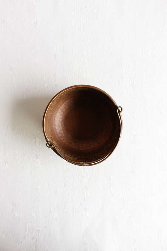 vintage european hammered copper bowl with handle