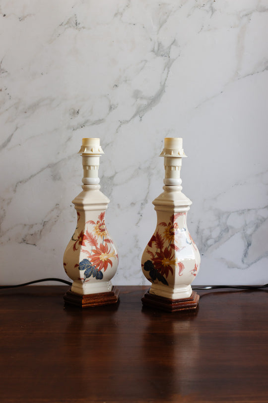 pair of vintage french handpainted porcelain lamps with fringed shades