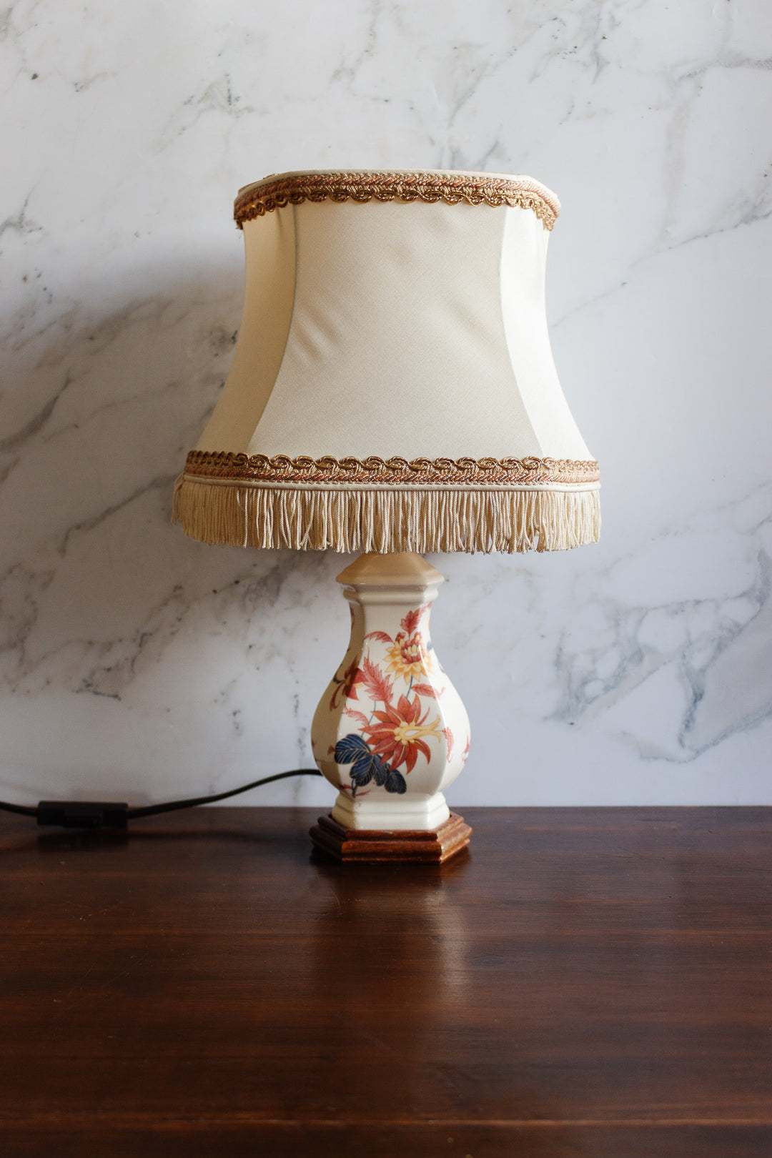 pair of vintage french handpainted porcelain lamps with fringed shades