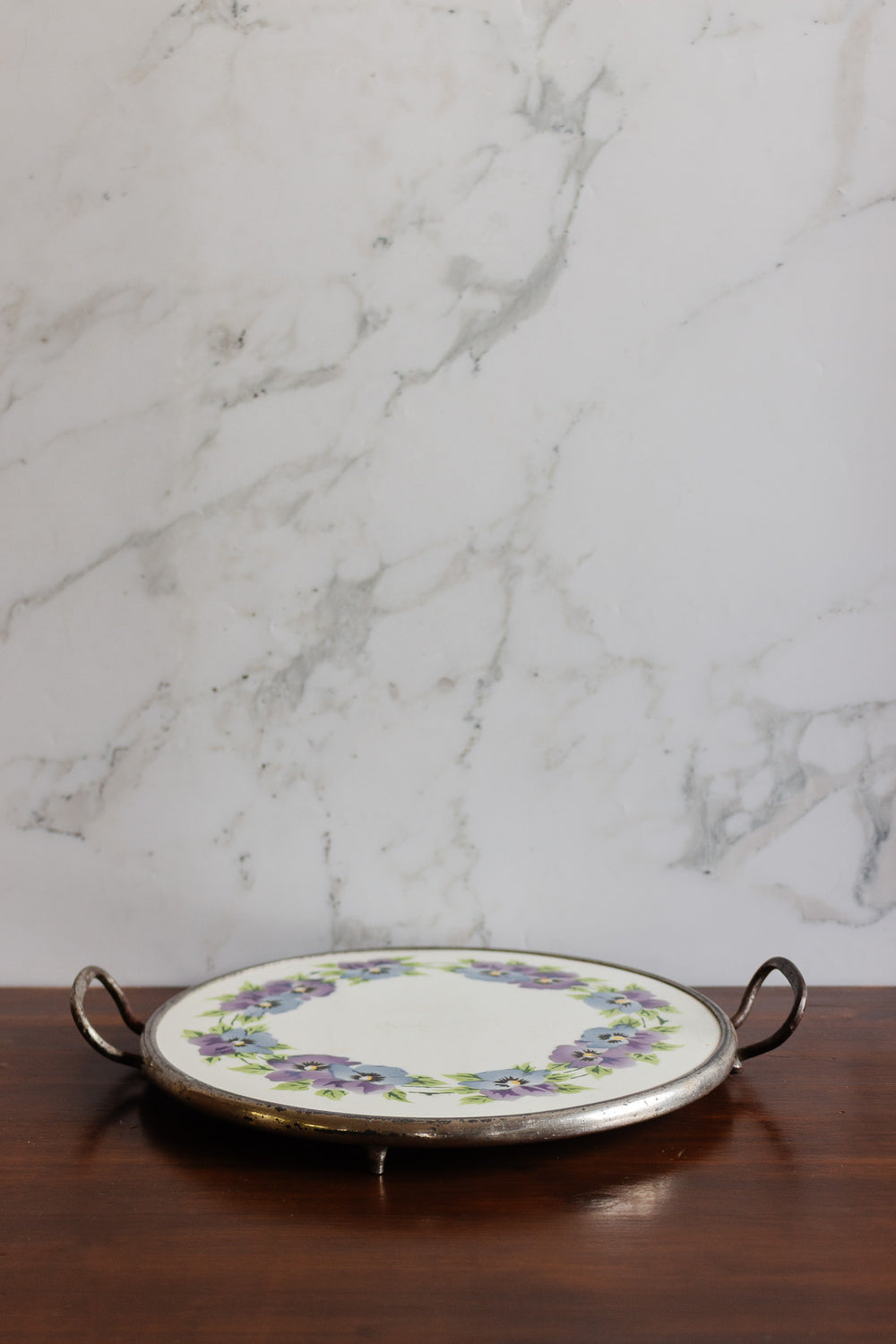 antique french porcelain trivet with metal handles