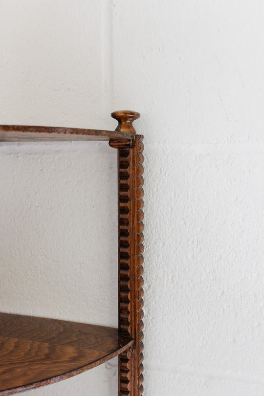 vintage english wood corner shelf with carved ornamentation