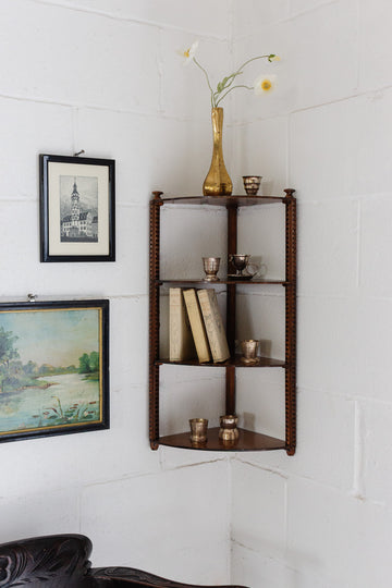 vintage english wood corner shelf with carved ornamentation