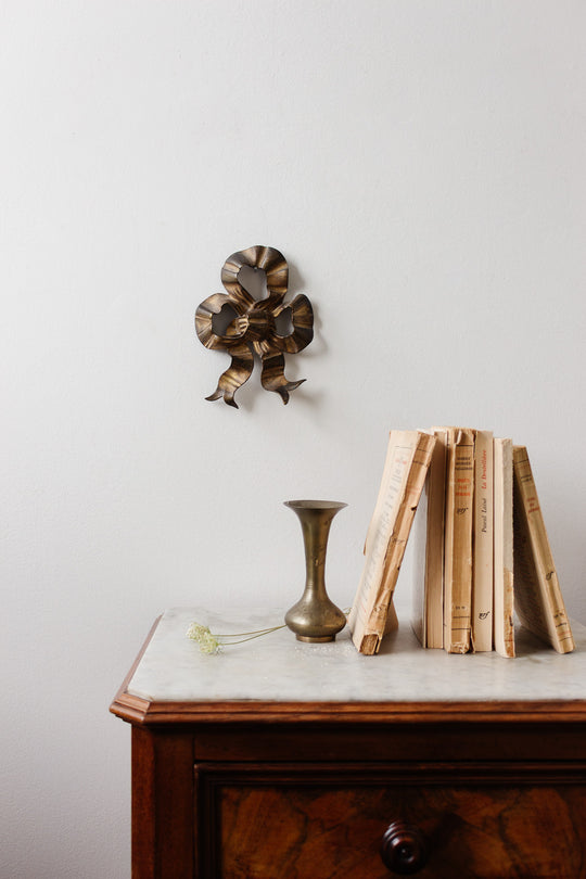 antique french oversized brass bow