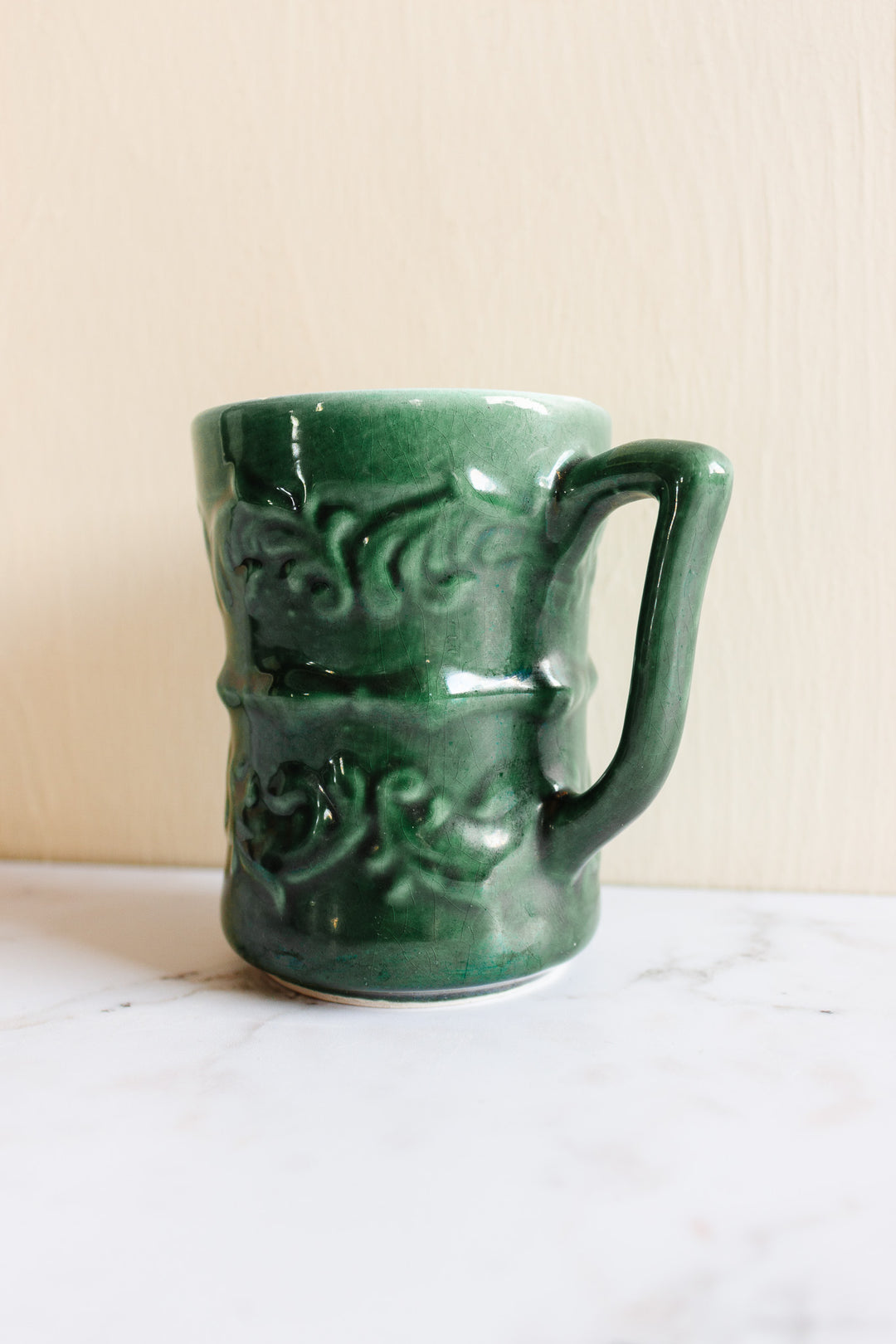pair of vintage French majolica mugs