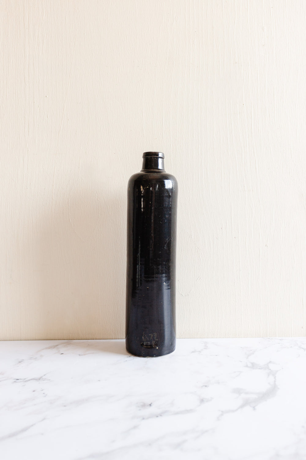 vintage french black stoneware liquor bottle