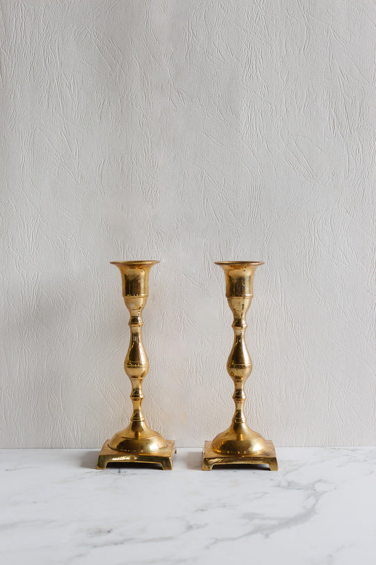 pair of vintage quintessentially french brass candlesticks