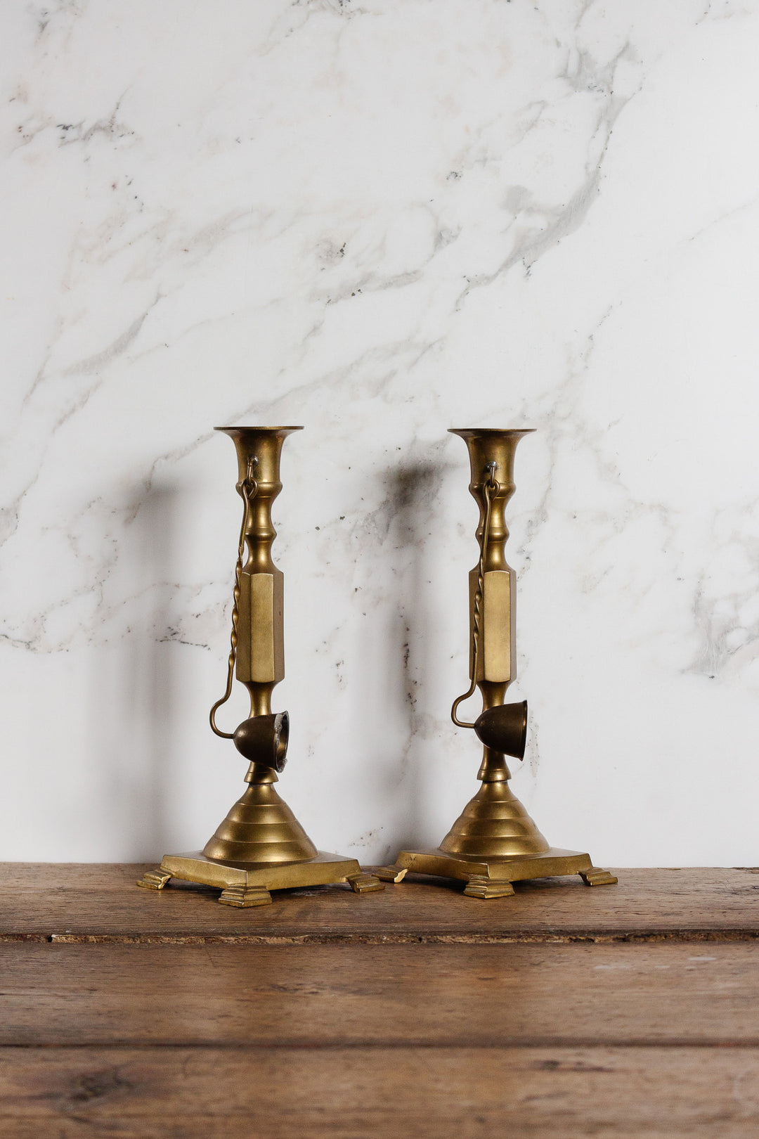 pair of antique french brass candlesticks with snuffers