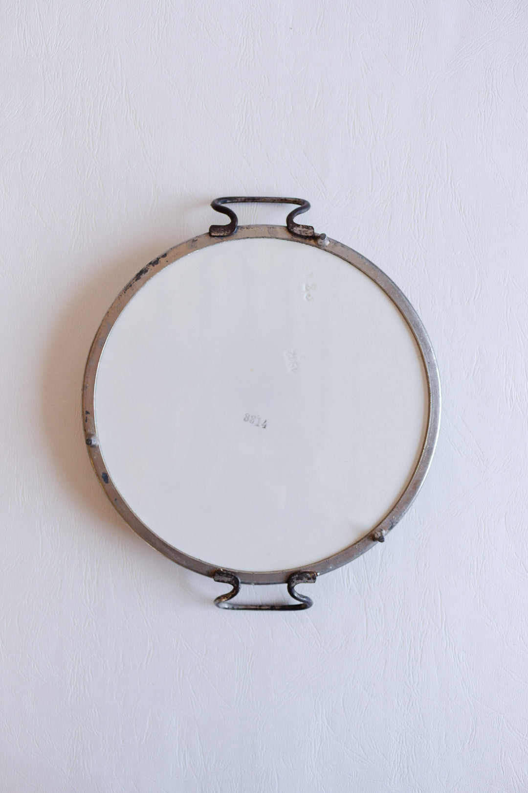 antique french porcelain trivet with metal handles